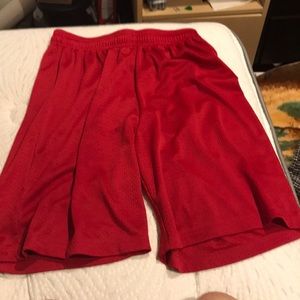 Red athletic drawstring shorts